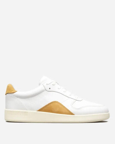 White with brown Everlane court sneaker, by Van der Veer